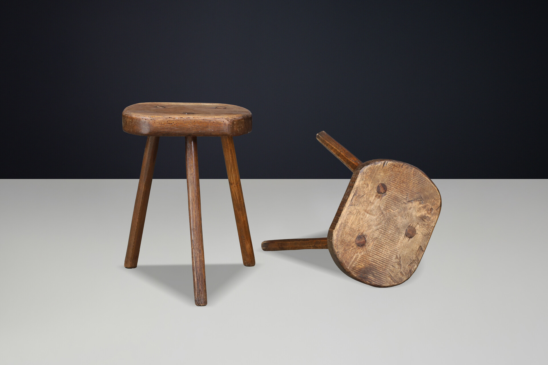 Pair of French Patinated Oak Primitive Stools, France, 1950s Mid-20th century