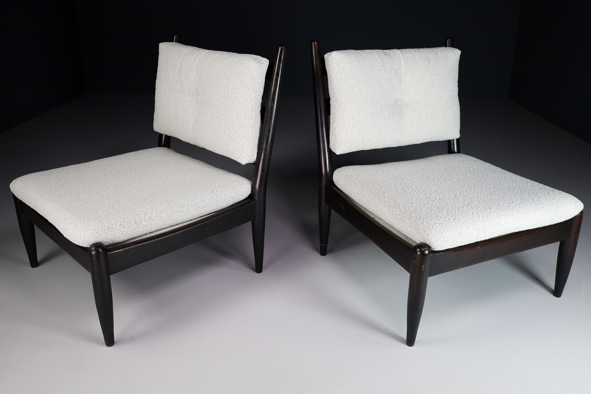 Primitive Pair lounge chair in dark wood and new Bouclé fabric, The Netherlands 1960s Mid-20th century