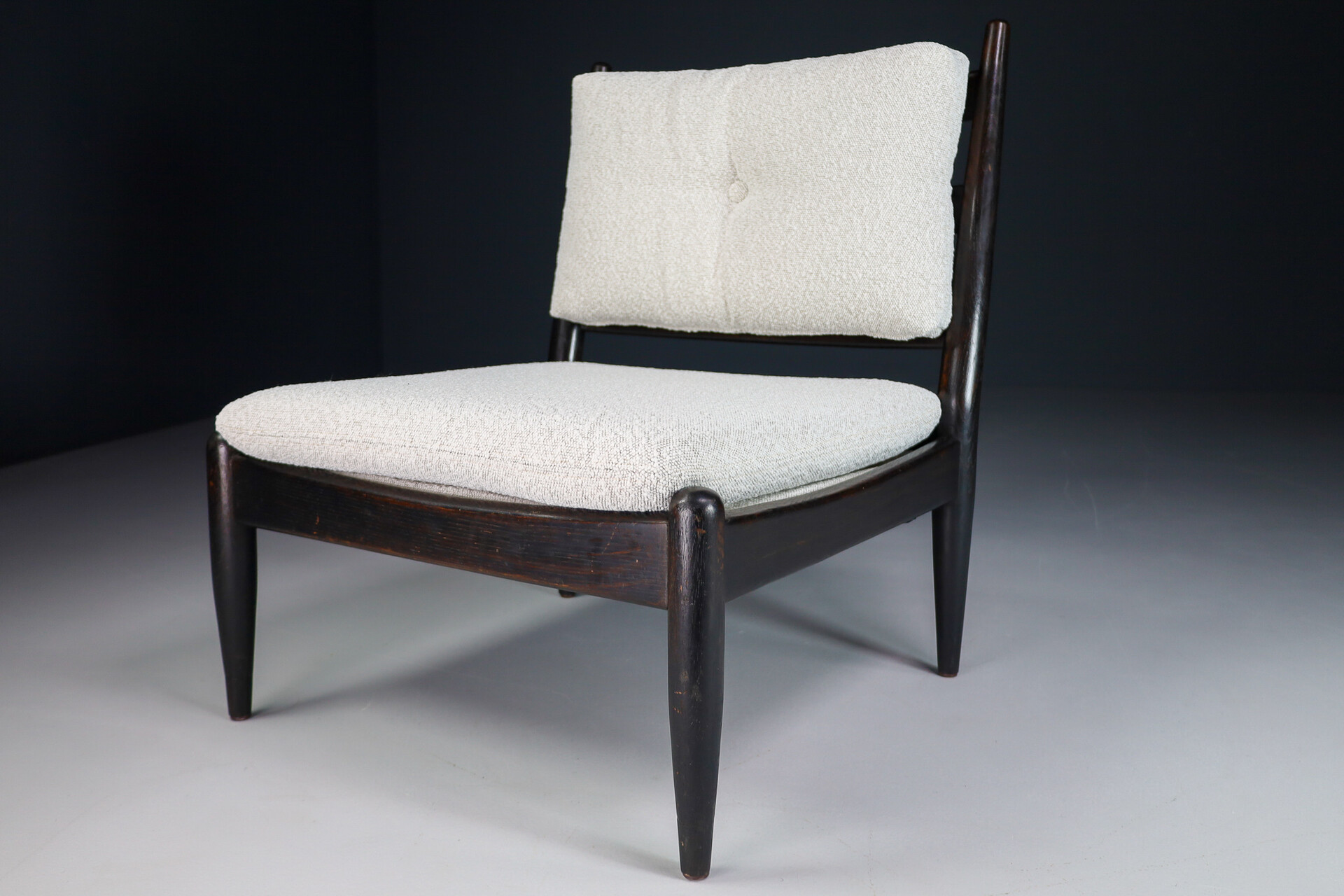 Primitive Pair lounge chair in dark wood and new Bouclé fabric, The Netherlands 1960s Mid-20th century