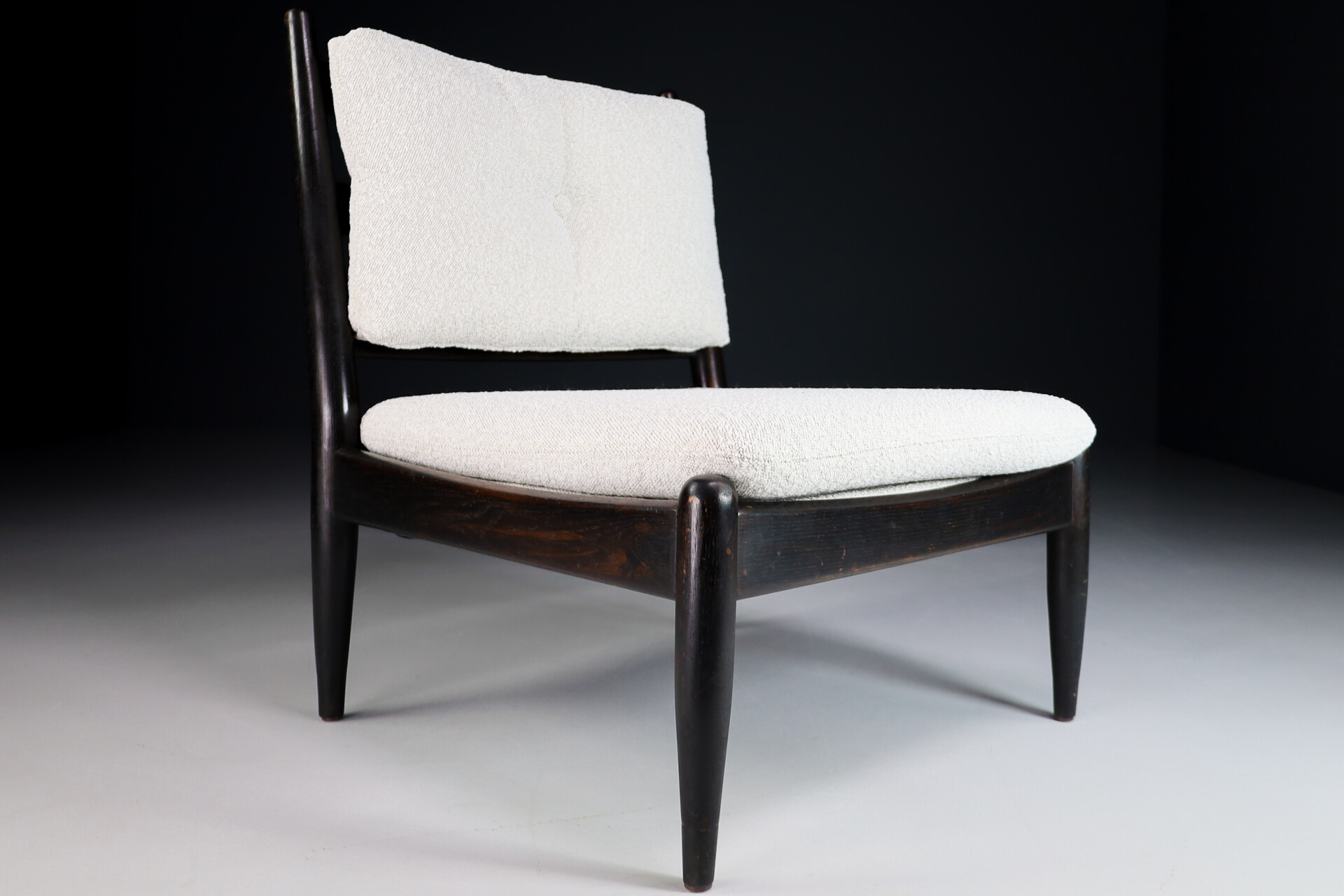 Primitive Pair lounge chair in dark wood and new Bouclé fabric, The Netherlands 1960s Mid-20th century