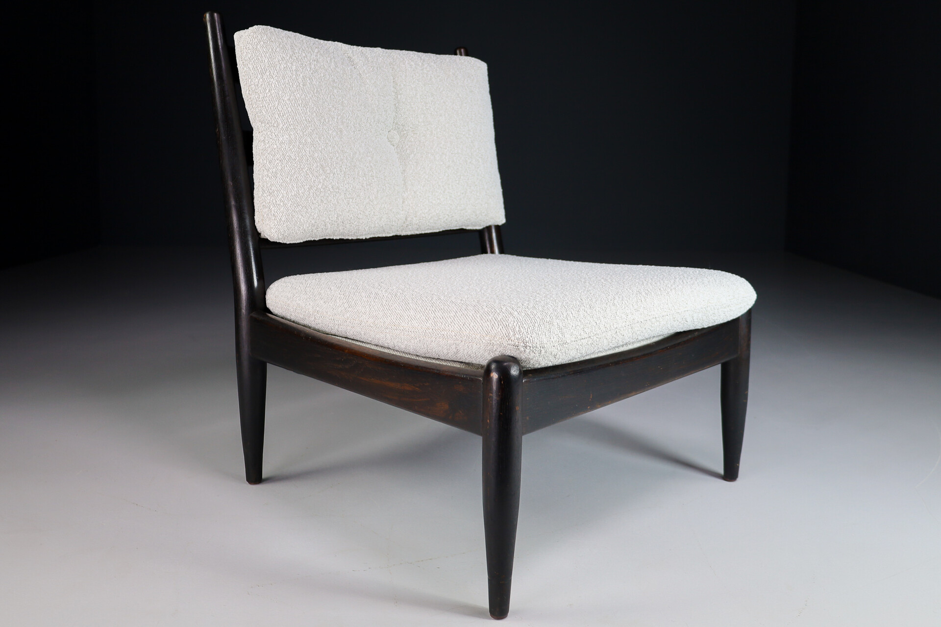 Primitive Pair lounge chair in dark wood and new Bouclé fabric, The Netherlands 1960s Mid-20th century