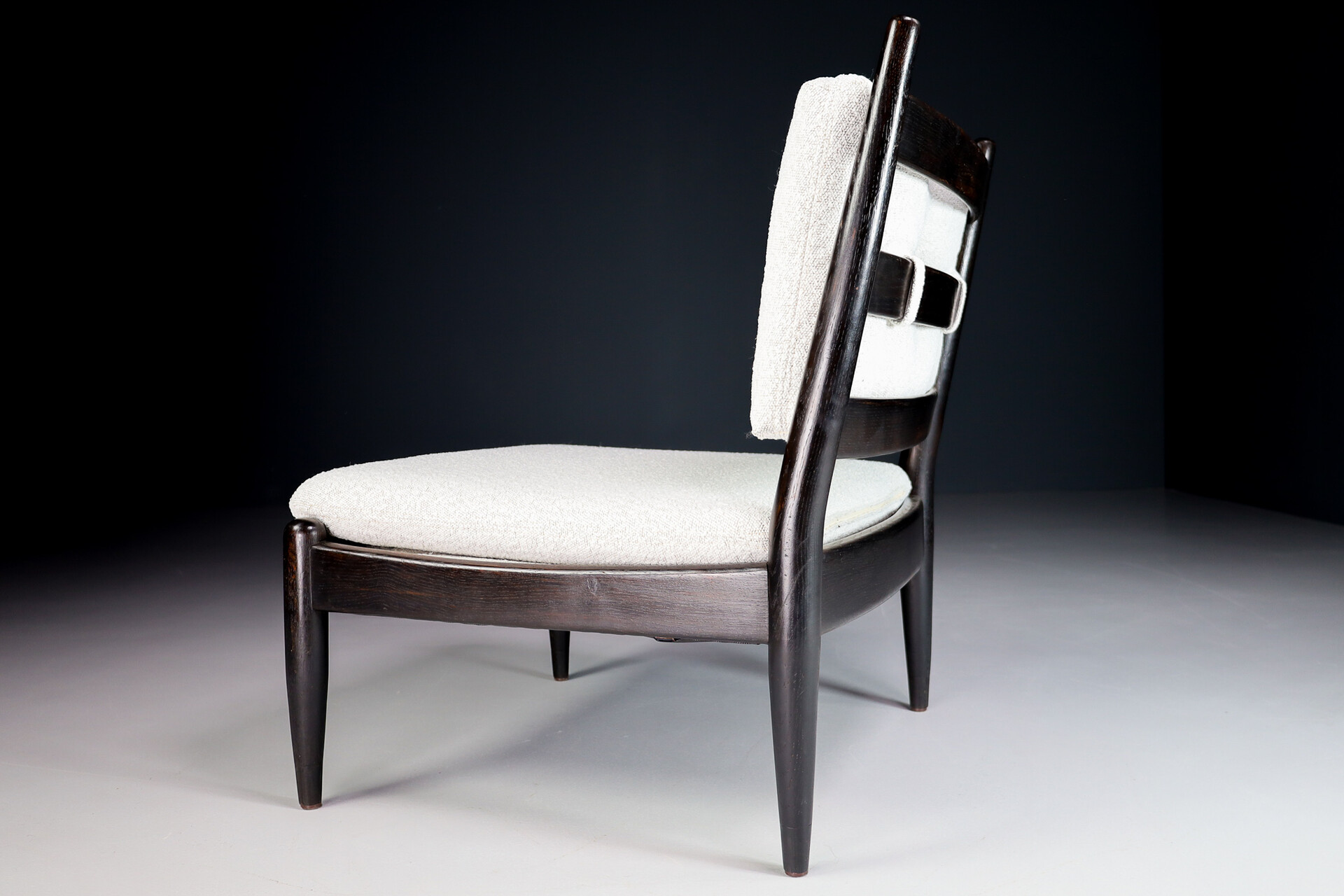 Primitive Pair lounge chair in dark wood and new Bouclé fabric, The Netherlands 1960s Mid-20th century