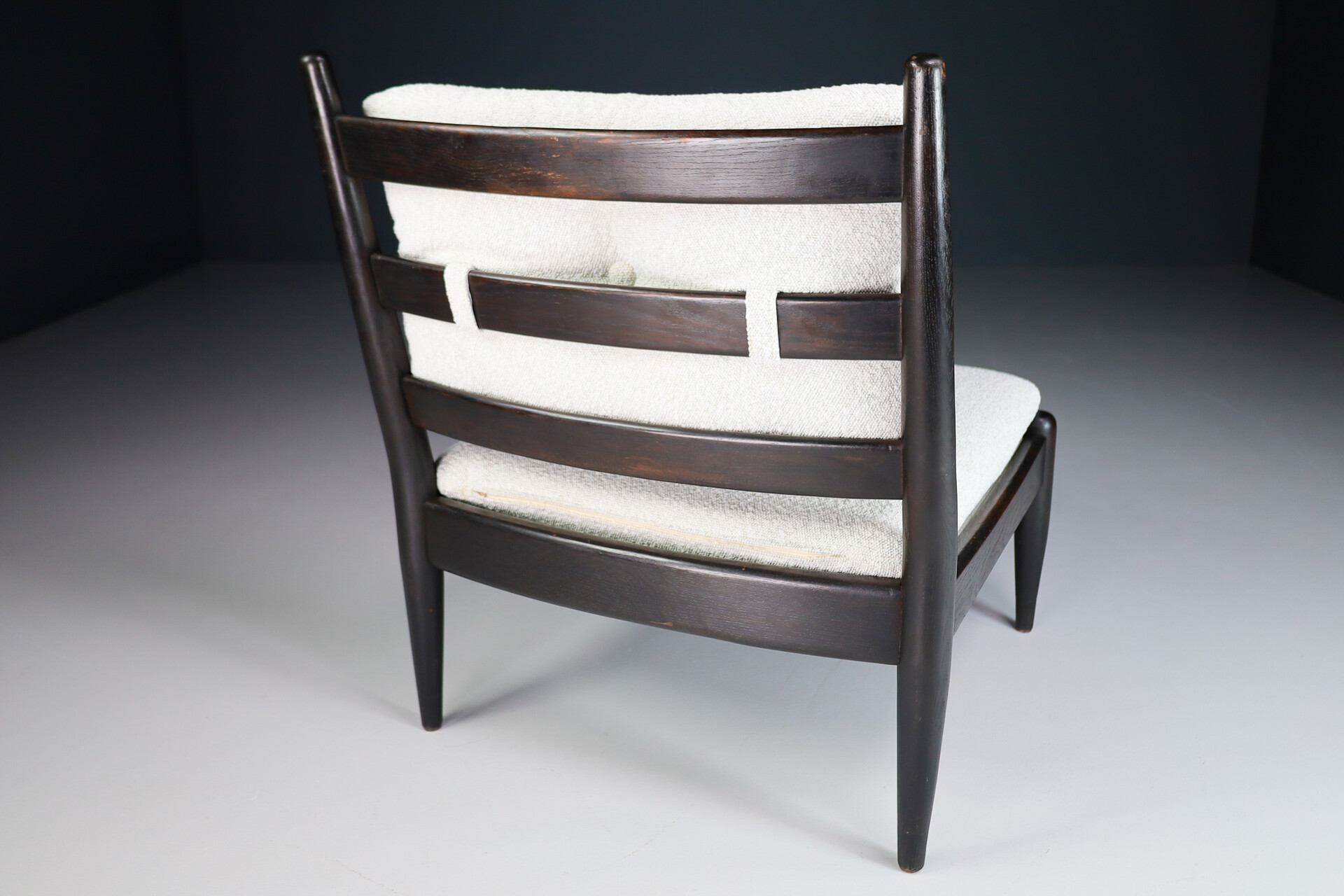 Primitive Pair lounge chair in dark wood and new Bouclé fabric, The Netherlands 1960s Mid-20th century