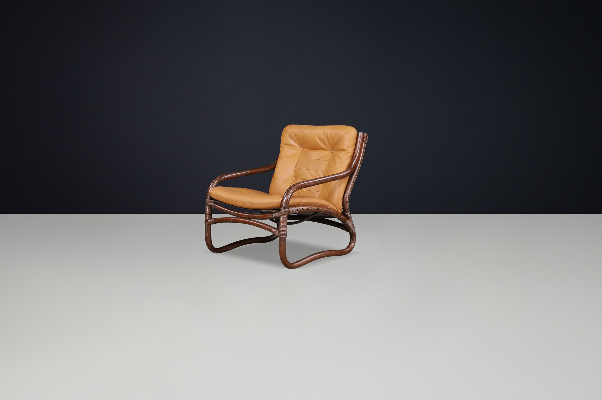 Scandinavian modern “Ecco” Easy Chair by Slettvoll in Cognac Leather and Patinated Rattan, Norway, 1970s Late-20th century