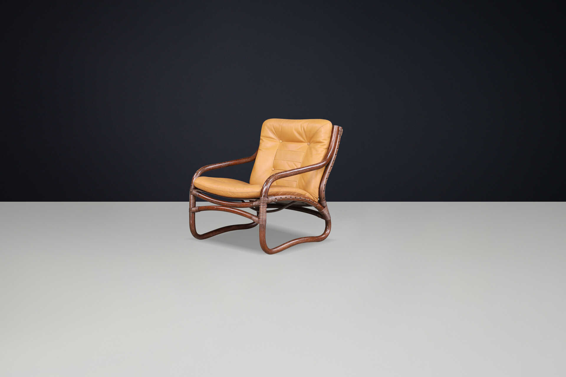 Scandinavian modern “Ecco” Easy Chair by Slettvoll in Cognac Leather and Patinated Rattan, Norway, 1970s Late-20th century