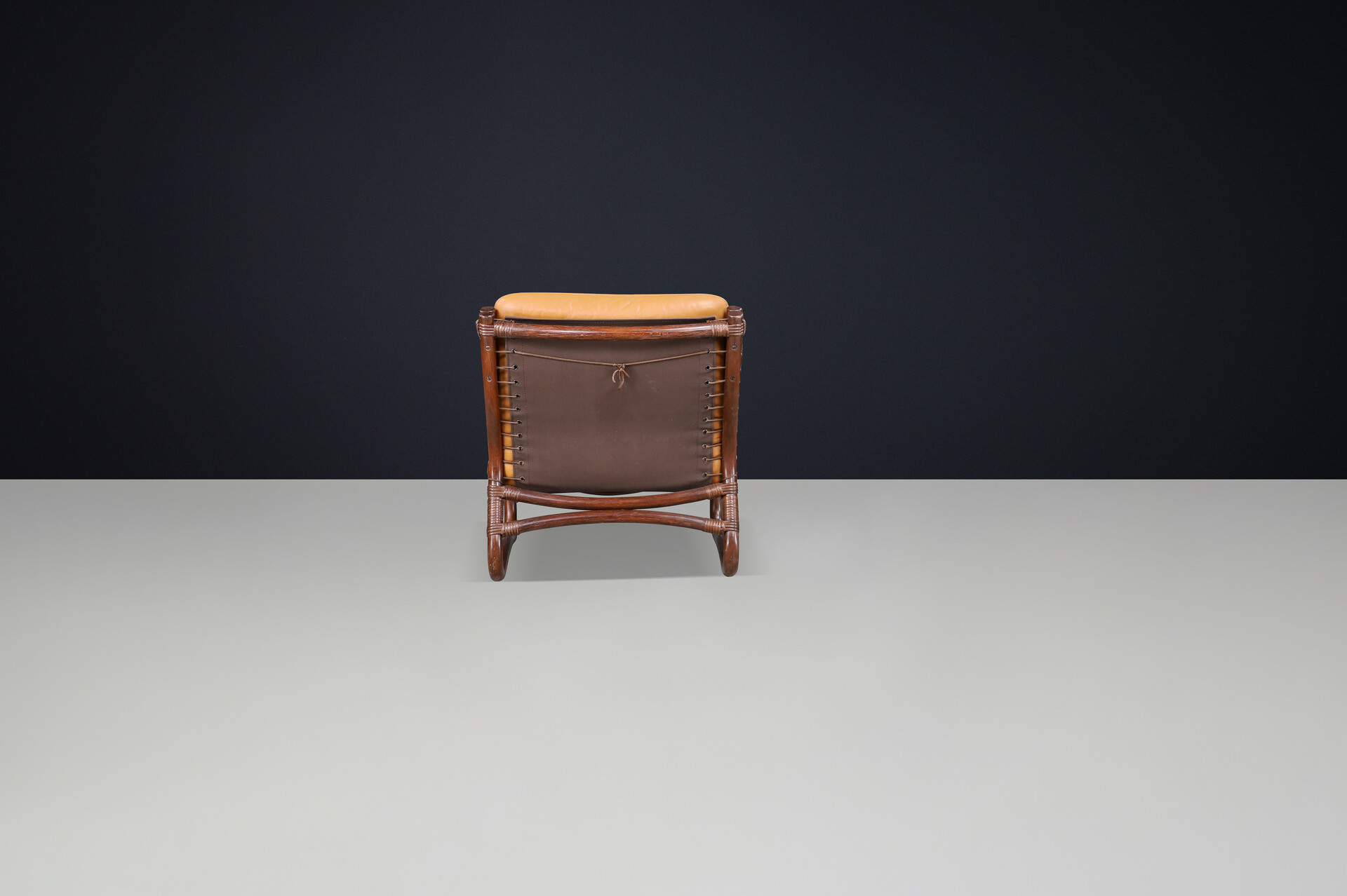 Scandinavian modern “Ecco” Easy Chair by Slettvoll in Cognac Leather and Patinated Rattan, Norway, 1970s Late-20th century