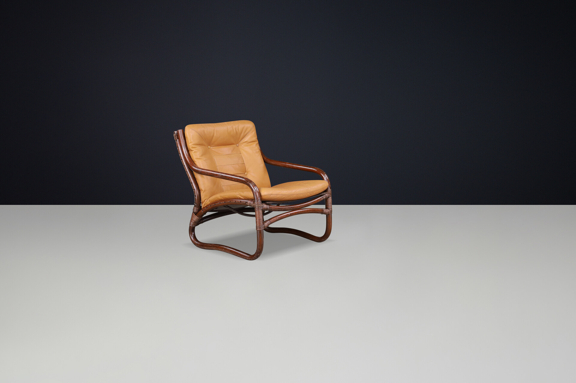 Scandinavian modern “Ecco” Easy Chair by Slettvoll in Cognac Leather and Patinated Rattan, Norway, 1970s Late-20th century