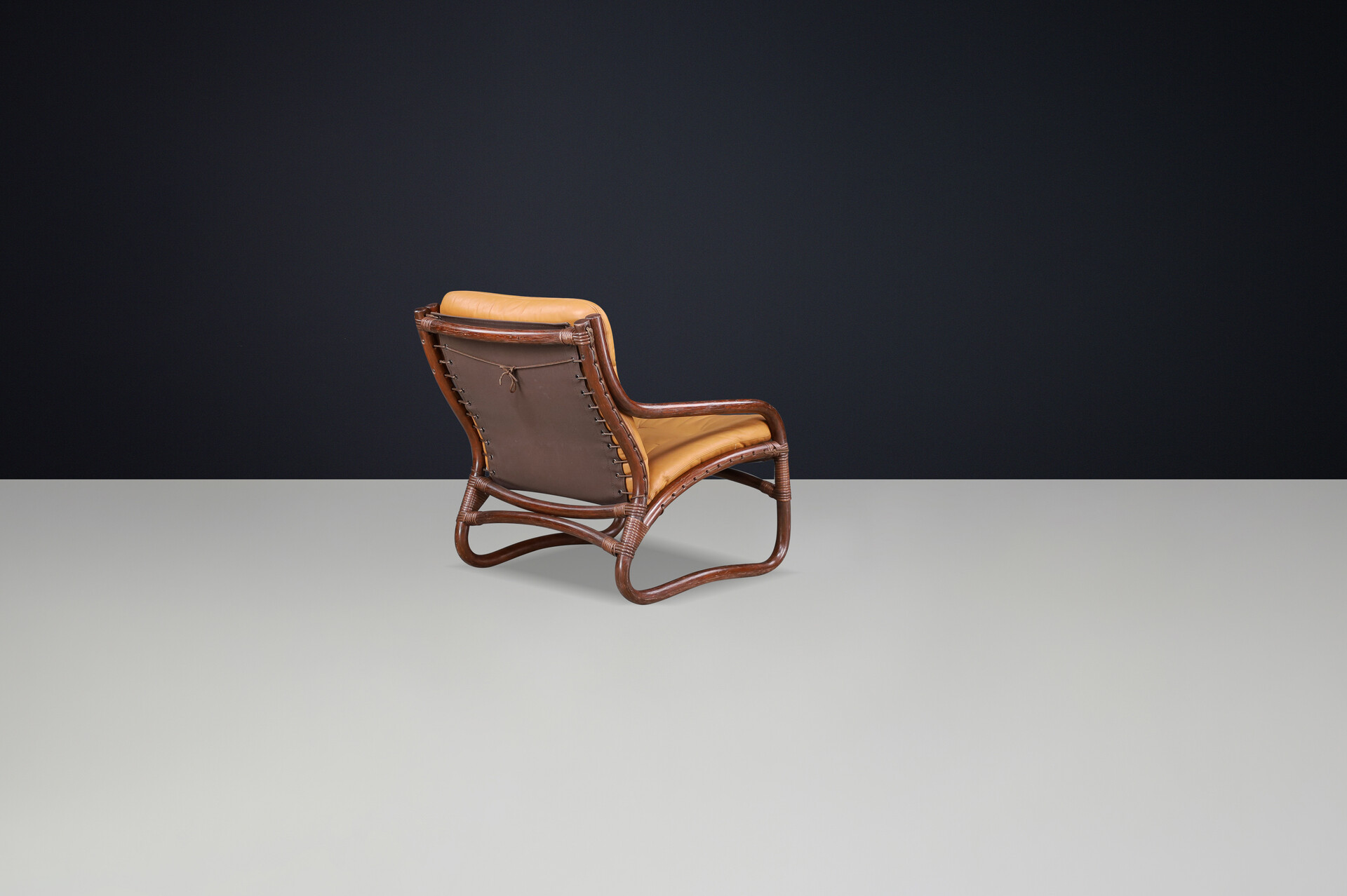 Scandinavian modern “Ecco” Easy Chair by Slettvoll in Cognac Leather and Patinated Rattan, Norway, 1970s Late-20th century