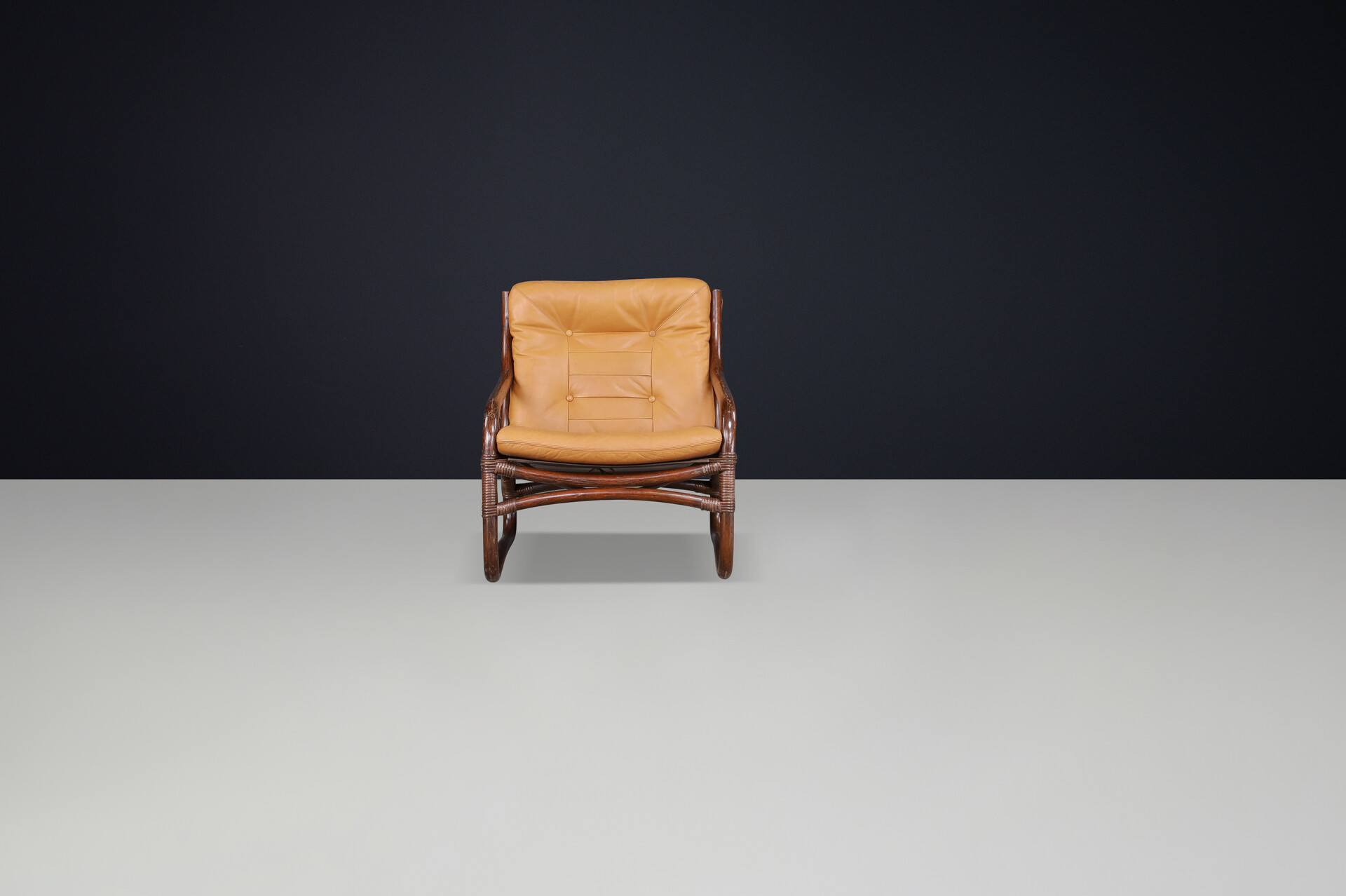 Scandinavian modern “Ecco” Easy Chair by Slettvoll in Cognac Leather and Patinated Rattan, Norway, 1970s Late-20th century