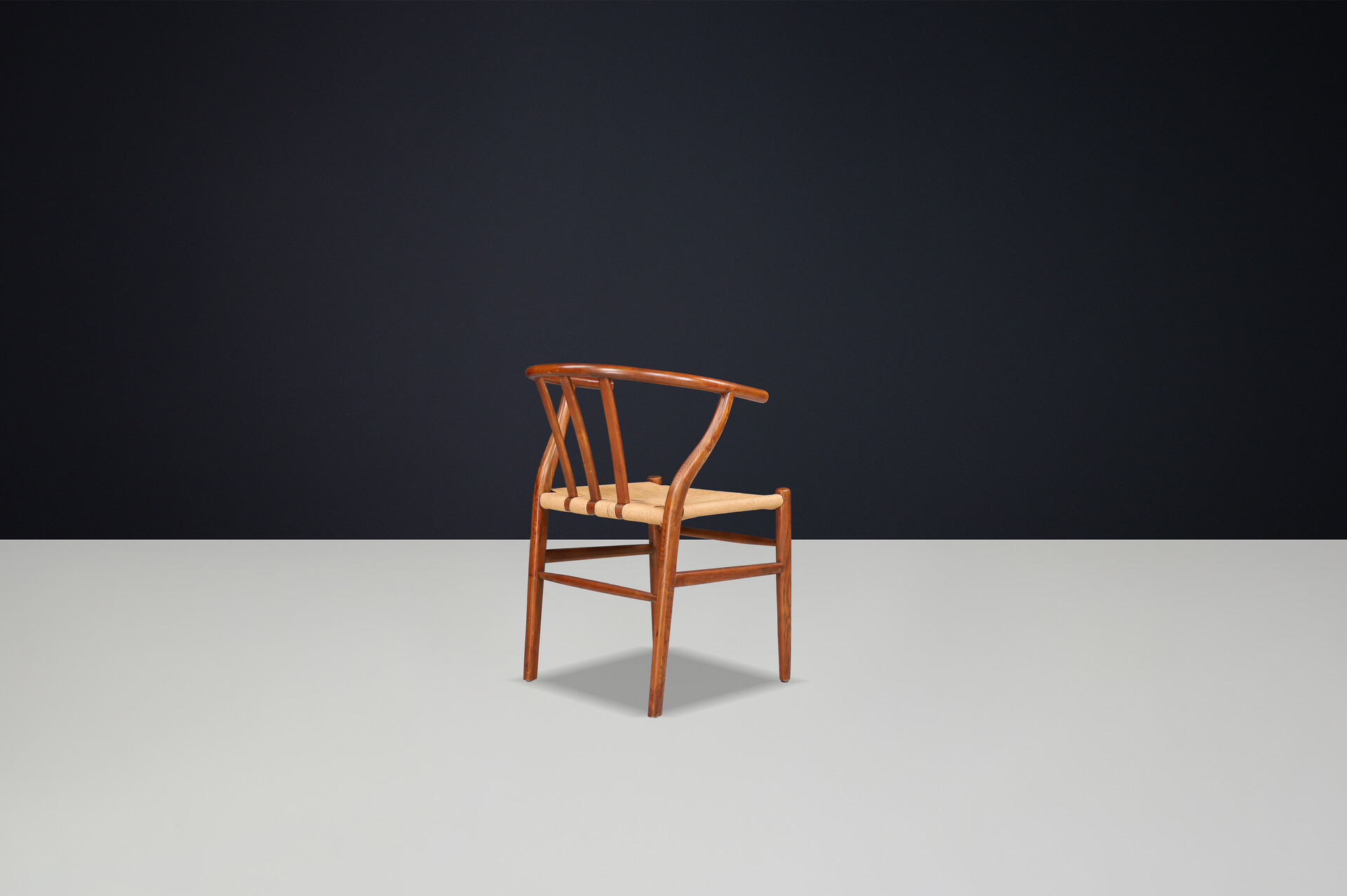 Scandinavian modern Wicker and Oak Arm chairs in the style of wishbone chair By Hans J. Wegner, Denmark 1960s Mid-20th century