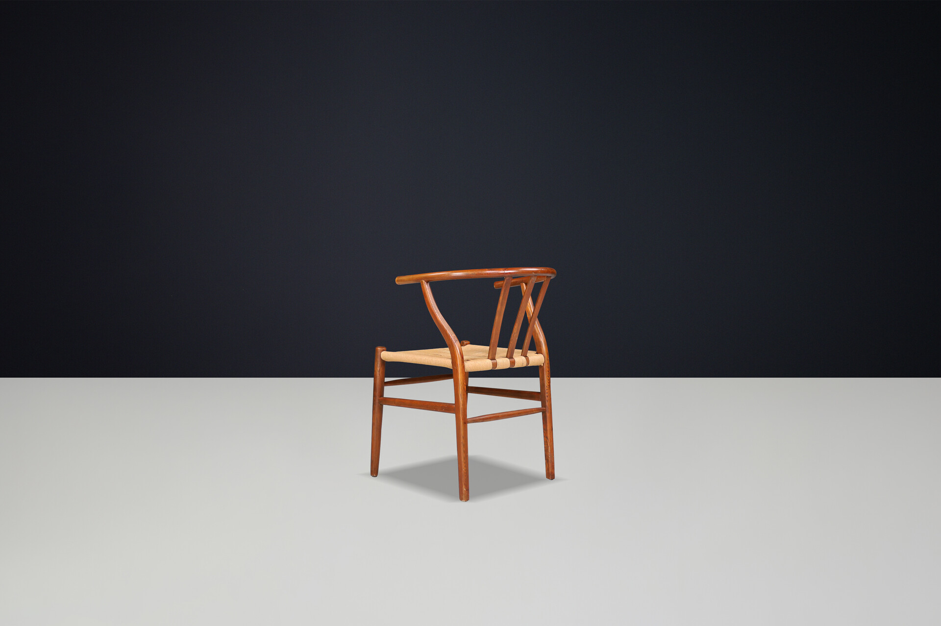 Scandinavian modern Wicker and Oak Arm chairs in the style of wishbone chair By Hans J. Wegner, Denmark 1960s Mid-20th century