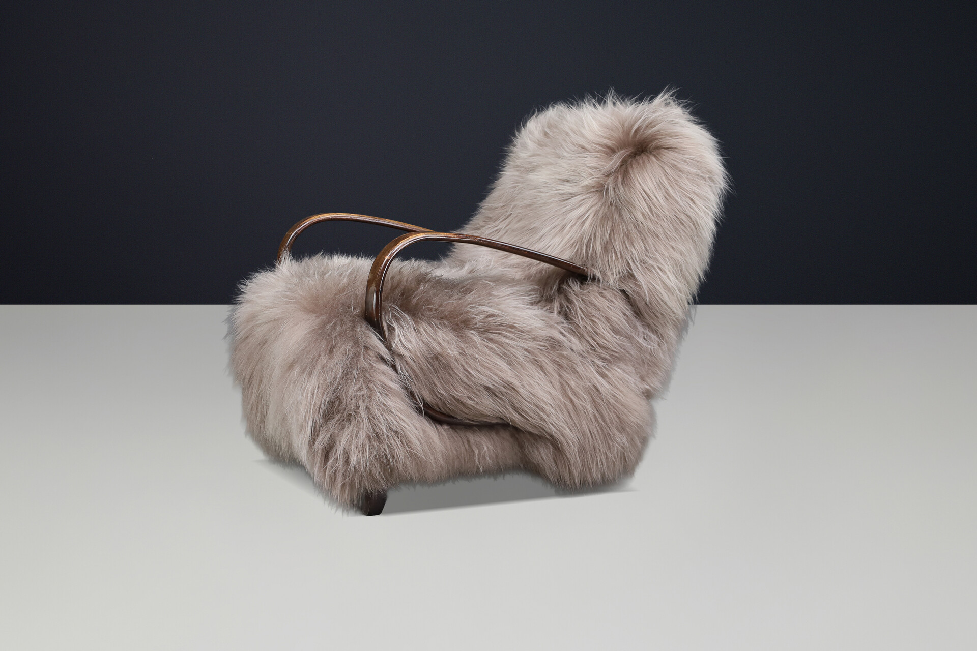 Sculptural Art Deco lounge chair by Jindřich Halabala, in luxurious Icelandic sheepskin CZ 1940 Mid-20th century