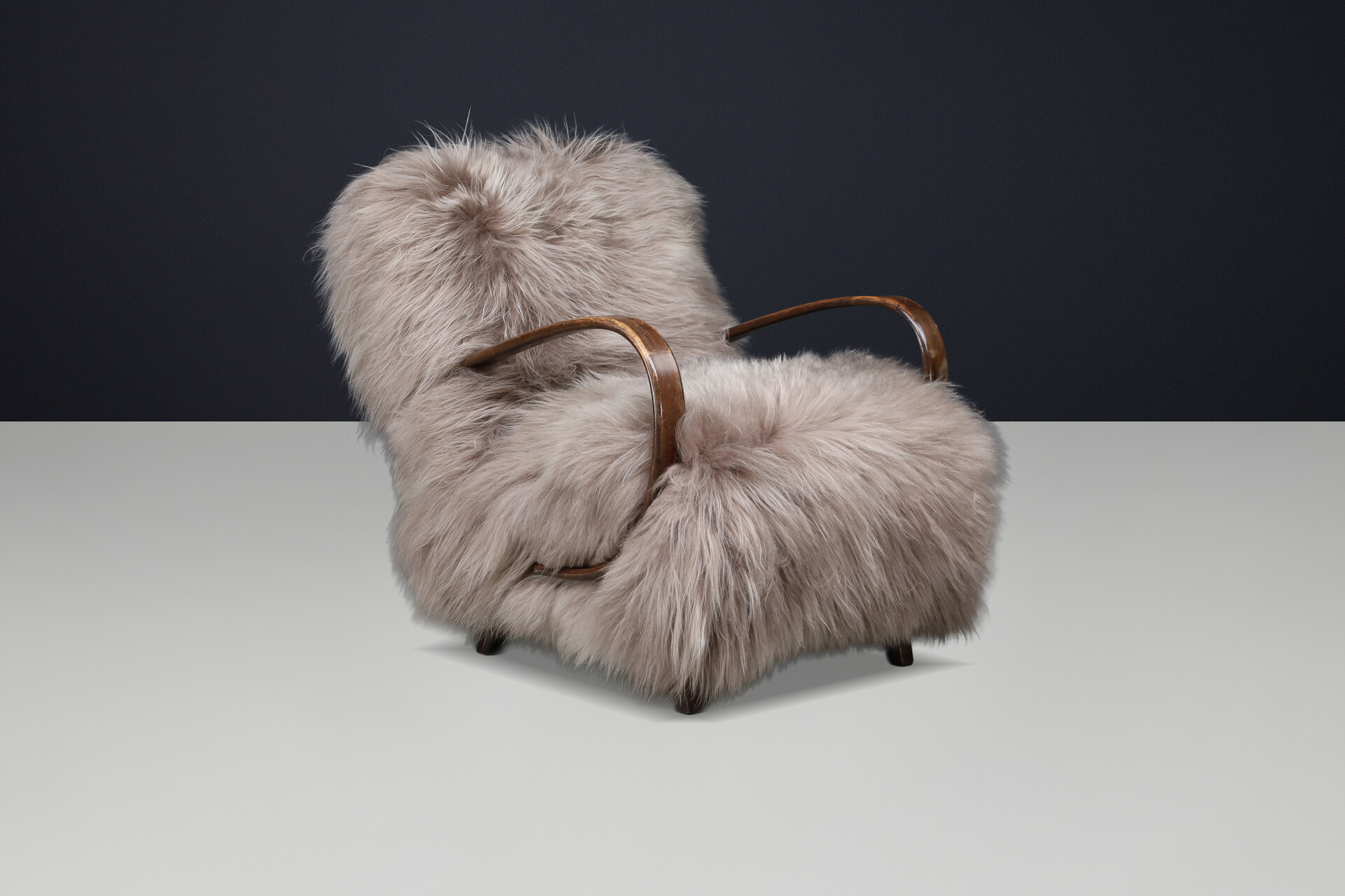 Sculptural Art Deco lounge chair by Jindřich Halabala, in luxurious Icelandic sheepskin CZ 1940 Mid-20th century