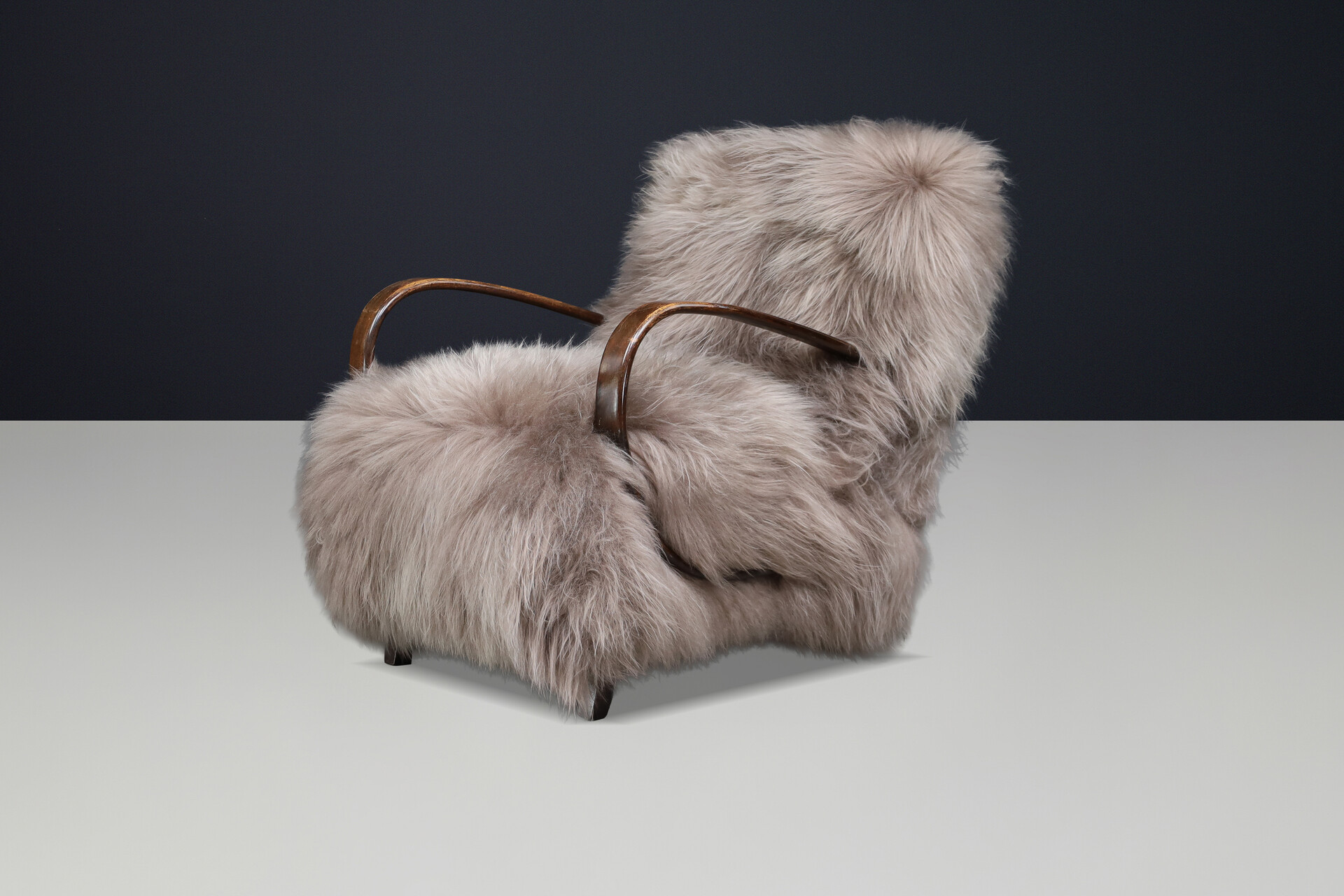 Sculptural Art Deco lounge chair by Jindřich Halabala, in luxurious Icelandic sheepskin CZ 1940 Mid-20th century
