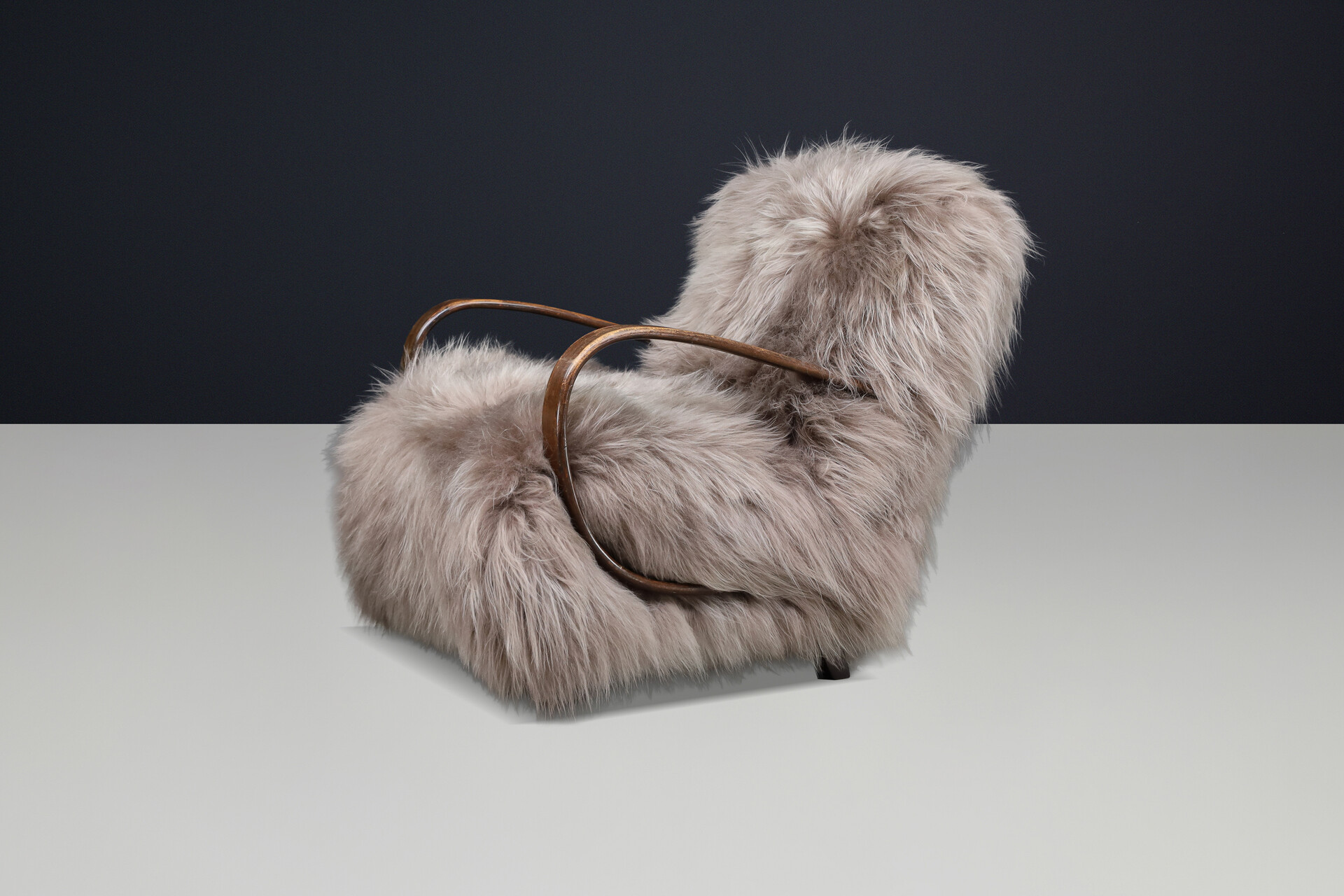 Sculptural Art Deco lounge chair by Jindřich Halabala, in luxurious Icelandic sheepskin CZ 1940 Mid-20th century