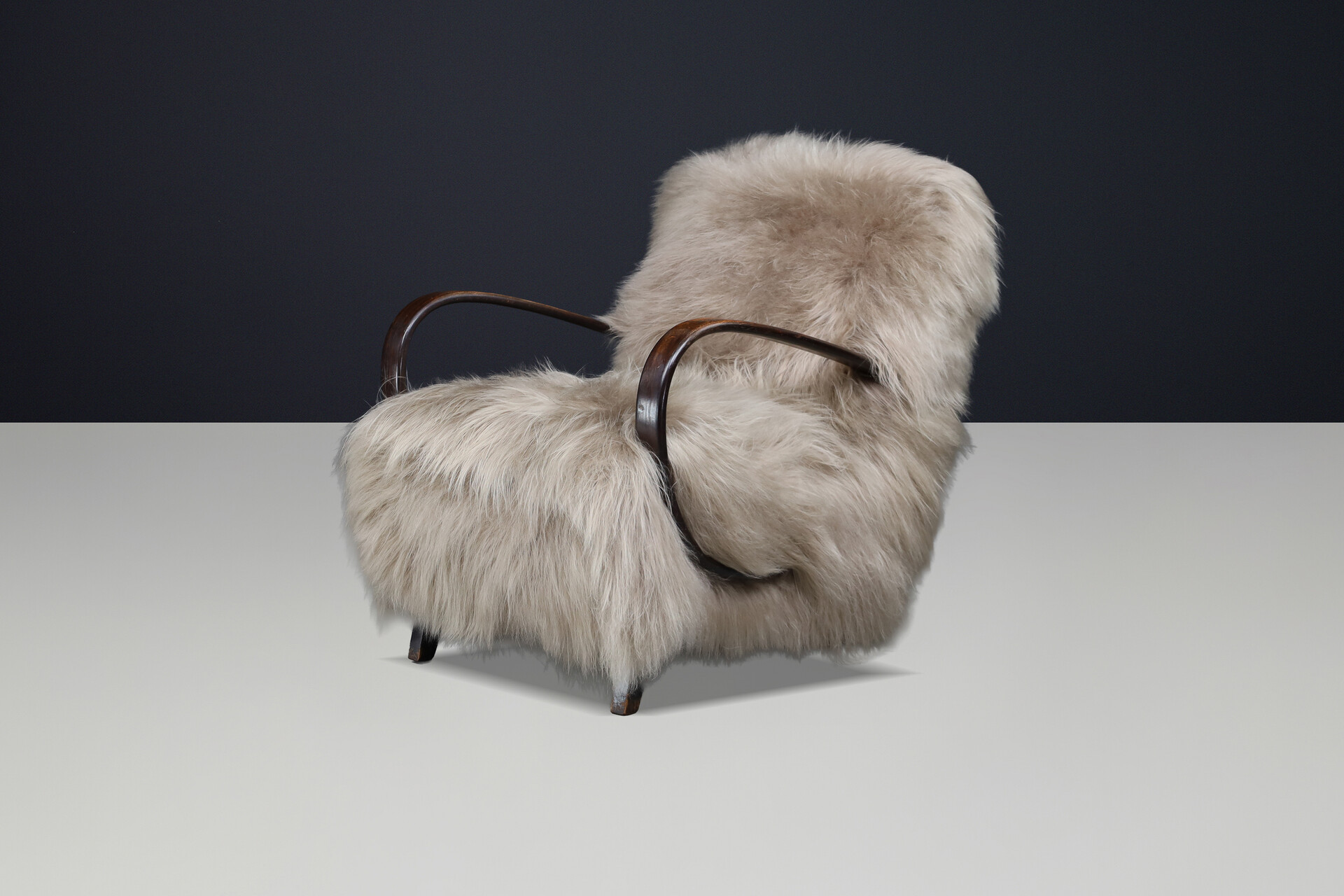 Sculptural Art Deco lounge chair by Jindřich Halabala, in luxurious Icelandic sheepskin CZ 1940 Mid-20th century