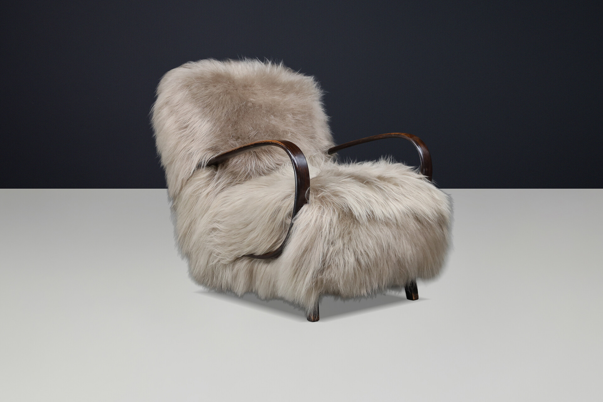 Sculptural Art Deco lounge chair by Jindřich Halabala, in luxurious Icelandic sheepskin CZ 1940 Mid-20th century