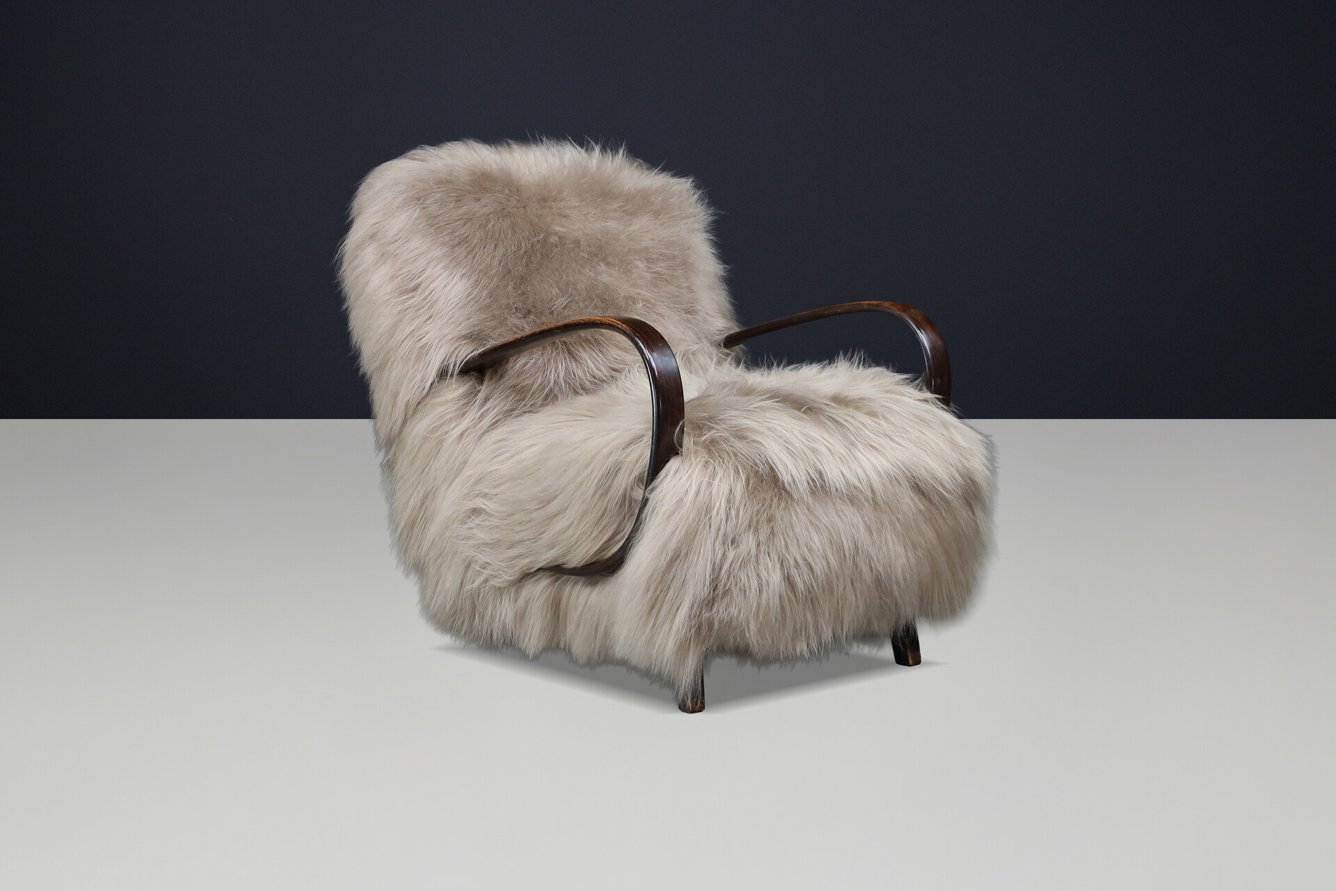 Sculptural Art Deco lounge chair by Jindřich Halabala, in luxurious Icelandic sheepskin CZ 1940 Mid-20th century