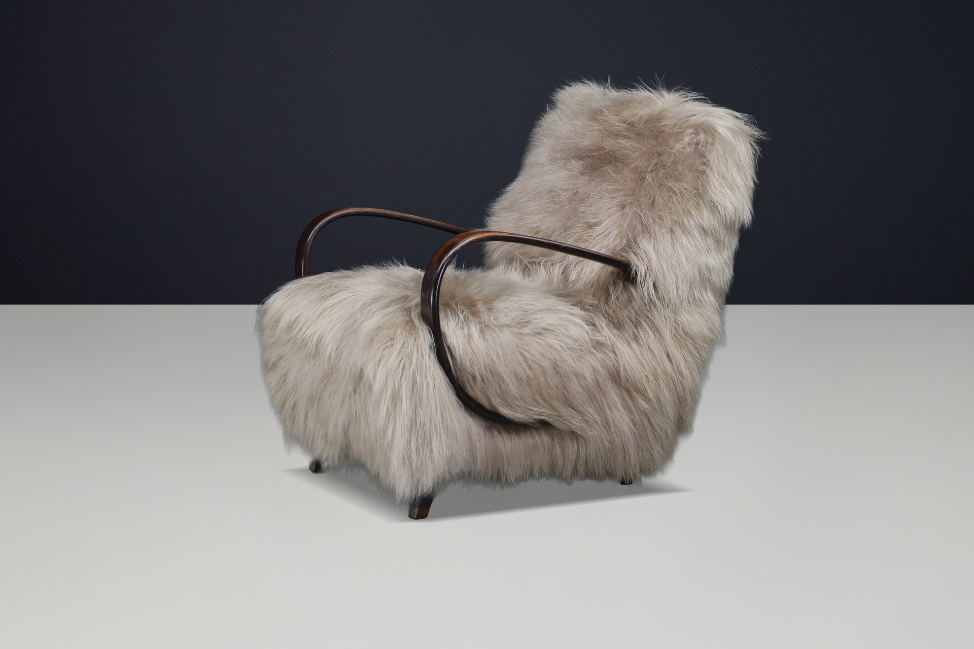 Sculptural Art Deco lounge chair by Jindřich Halabala, in luxurious Icelandic sheepskin CZ 1940 Mid-20th century