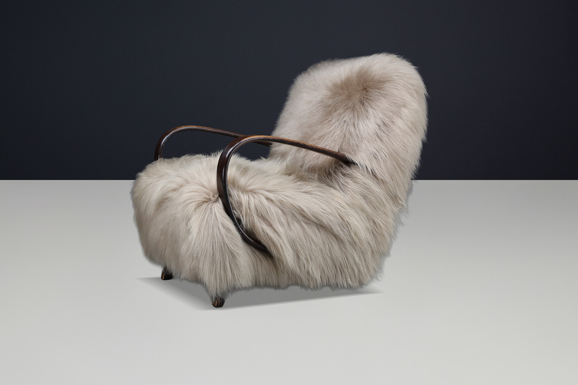 Sculptural Art Deco lounge chair by Jindřich Halabala, in luxurious Icelandic sheepskin CZ 1940 Mid-20th century