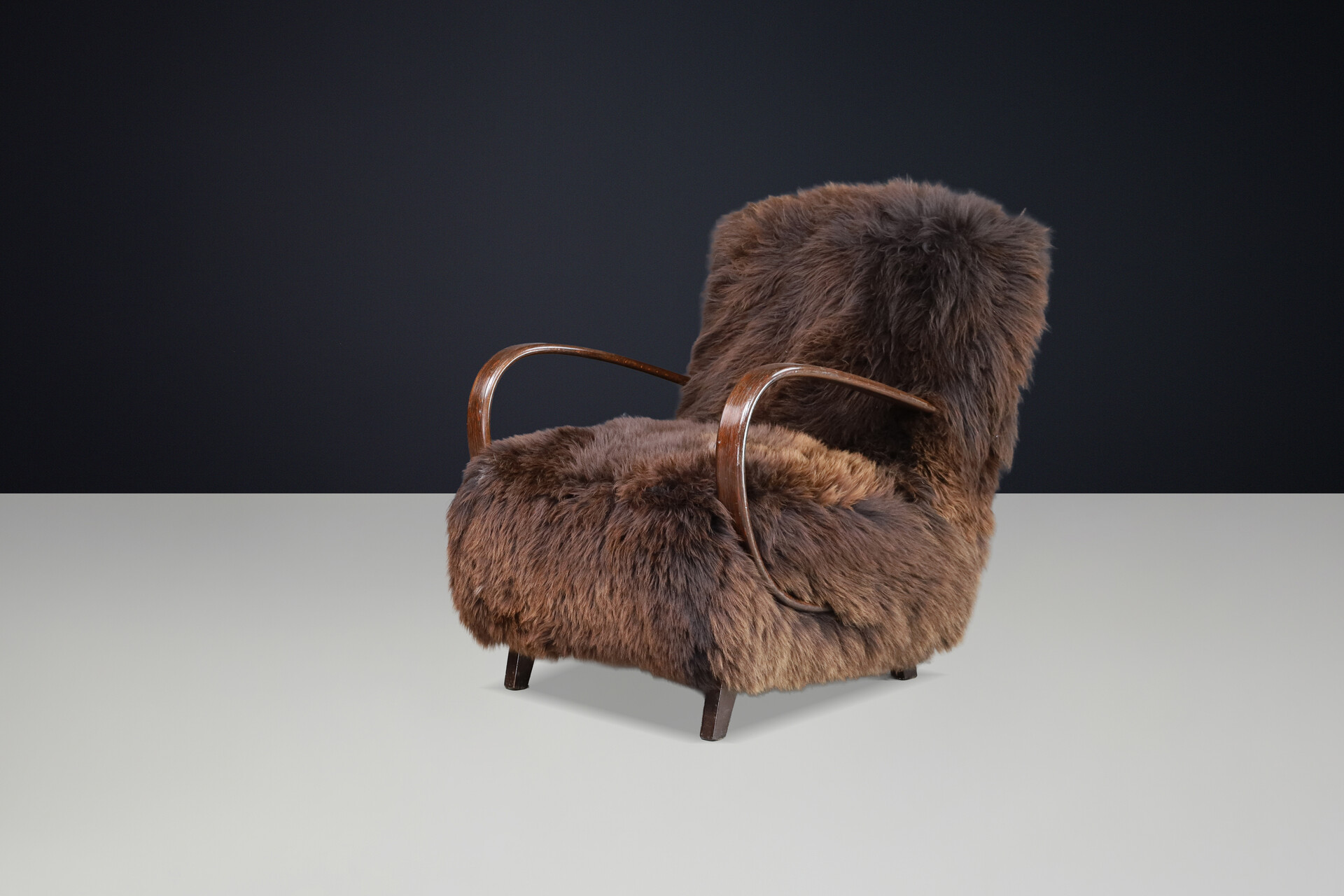 Sculptural Art Deco lounge chair by Jindřich Halabala, sheepskin CZ 1940 Mid-20th century