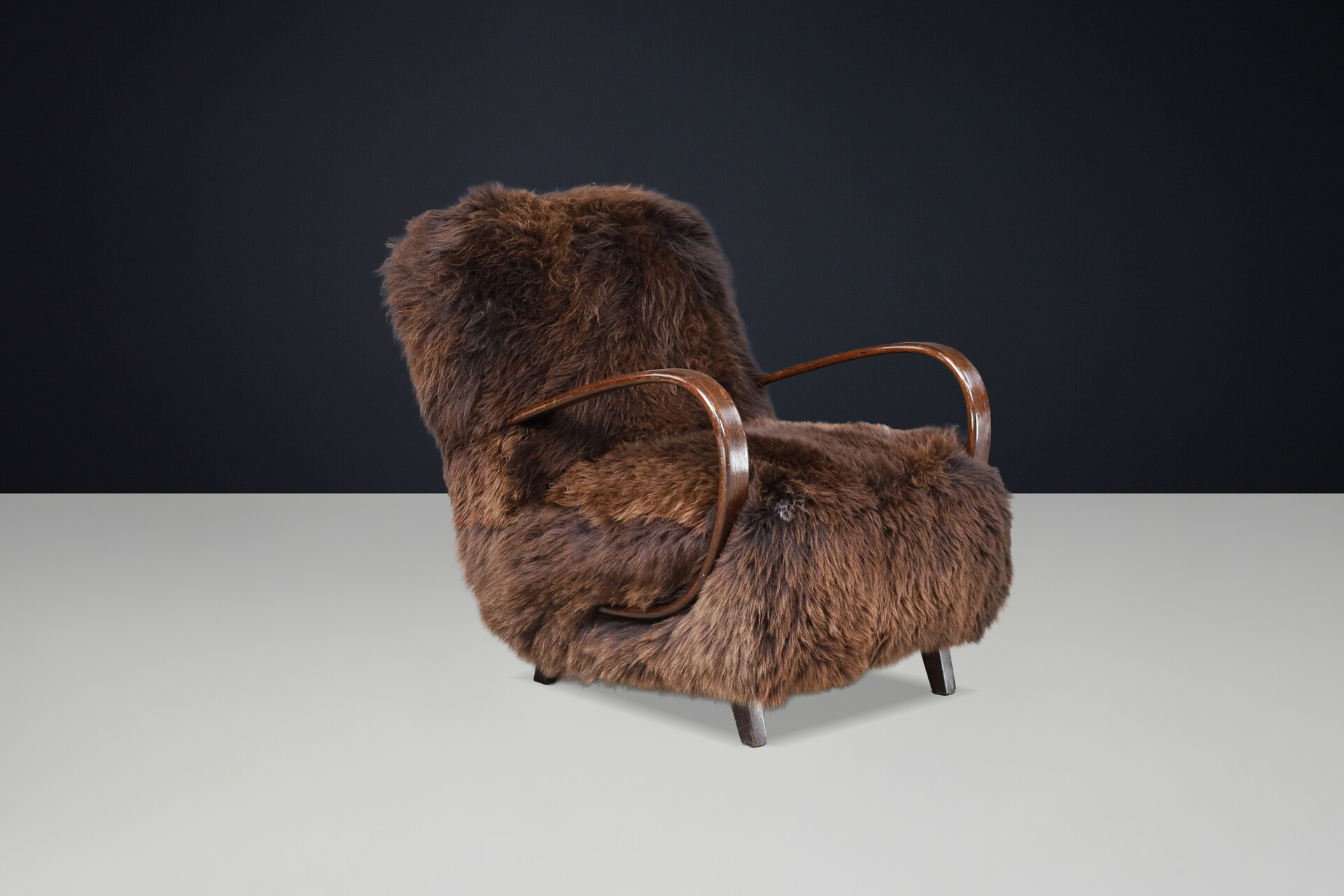 Sculptural Art Deco lounge chair by Jindřich Halabala, sheepskin CZ 1940 Mid-20th century