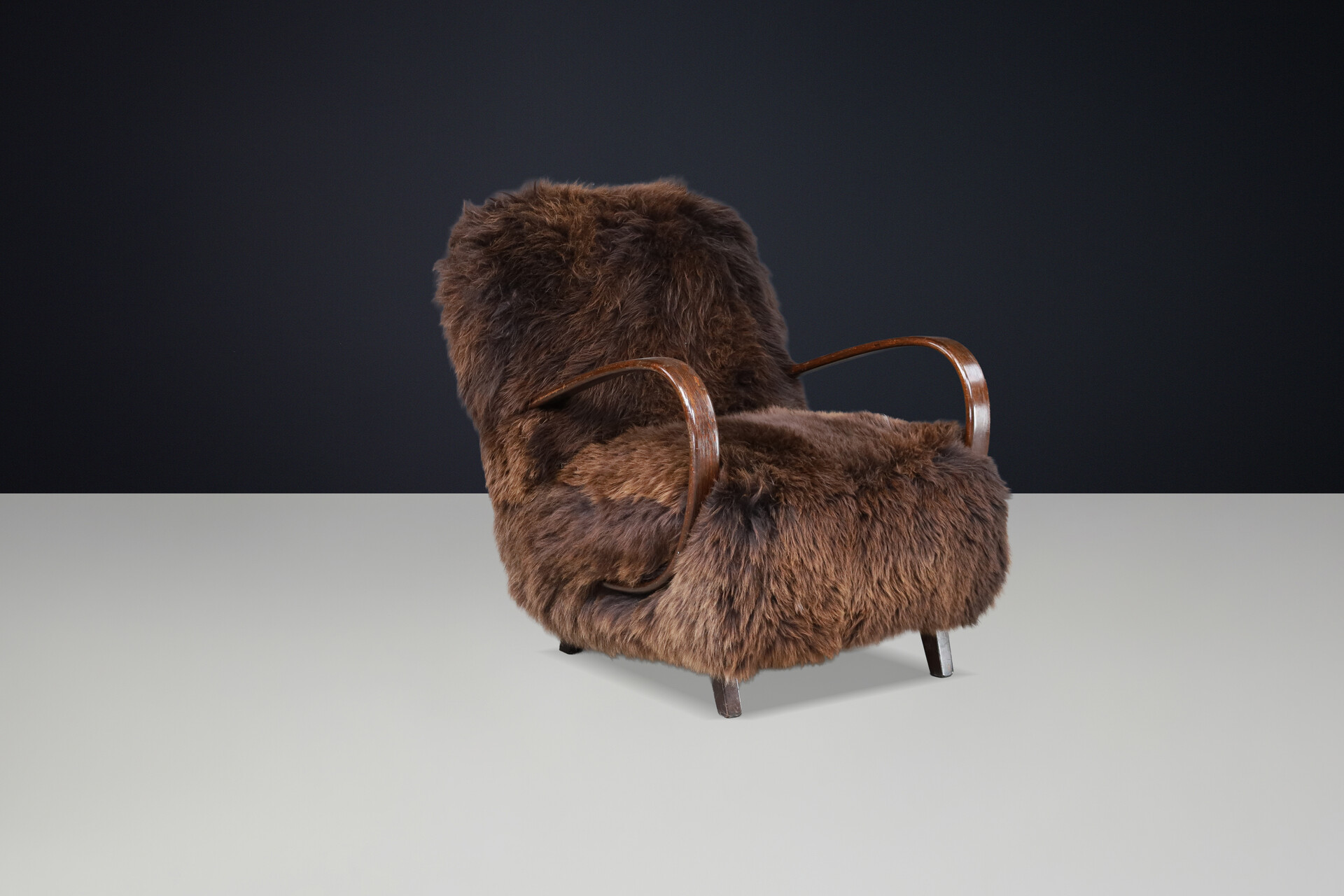 Sculptural Art Deco lounge chair by Jindřich Halabala, sheepskin CZ 1940 Mid-20th century
