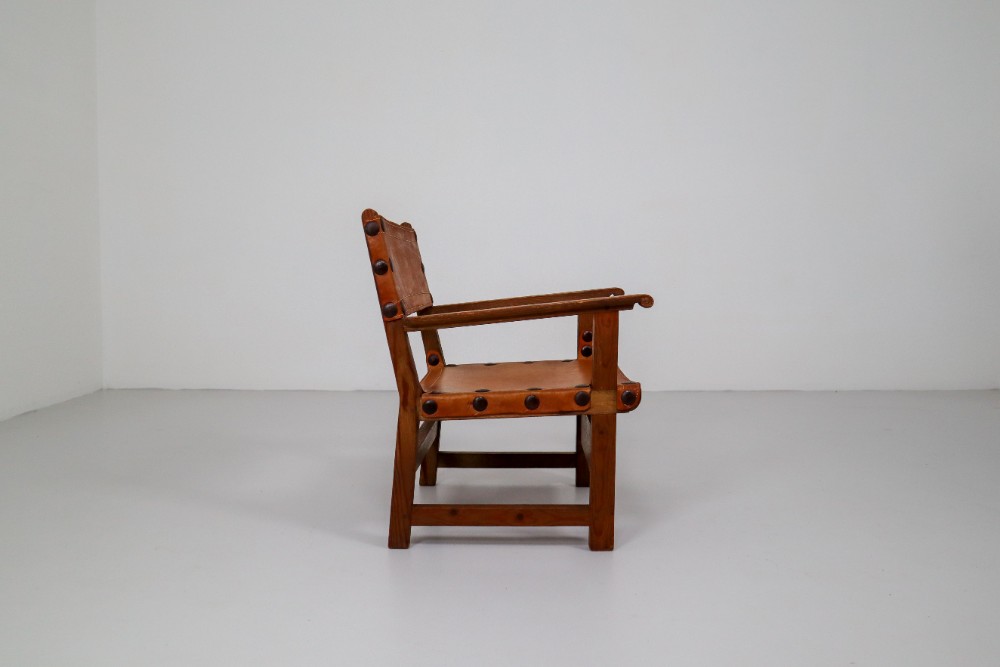 Six Midcentury French Lounge Chairs in Patinated Cognac Saddle Leather, 1950s