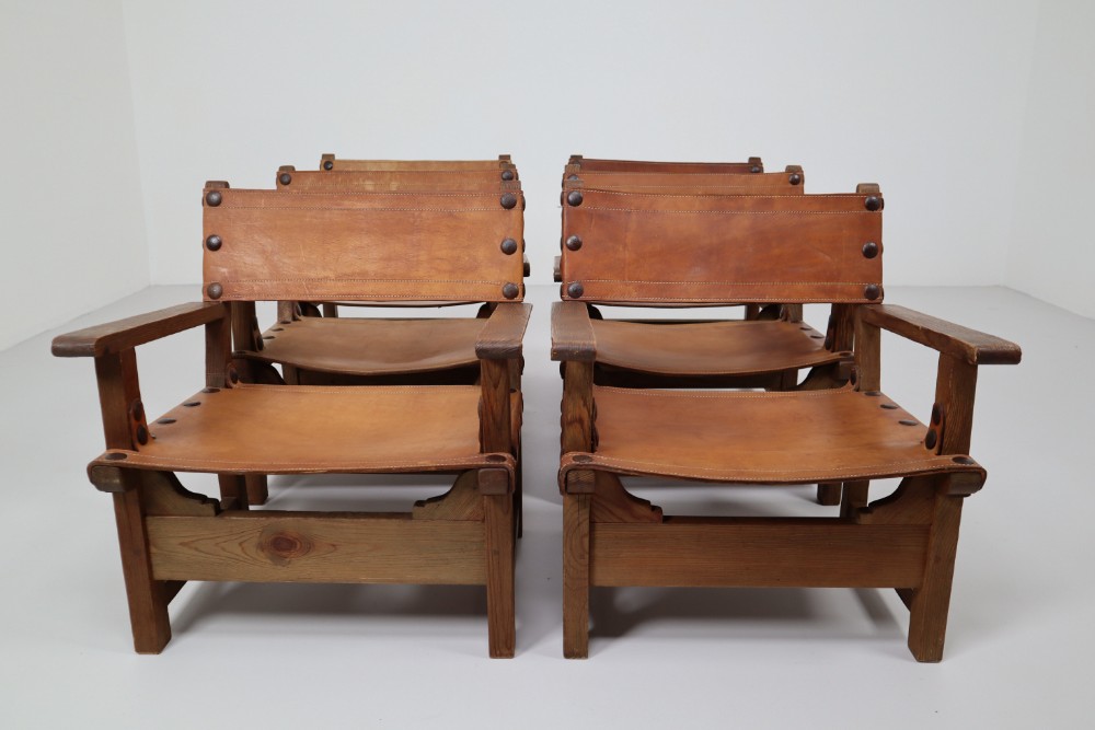Six Midcentury French Lounge Chairs in Patinated Cognac Saddle Leather, 1950s