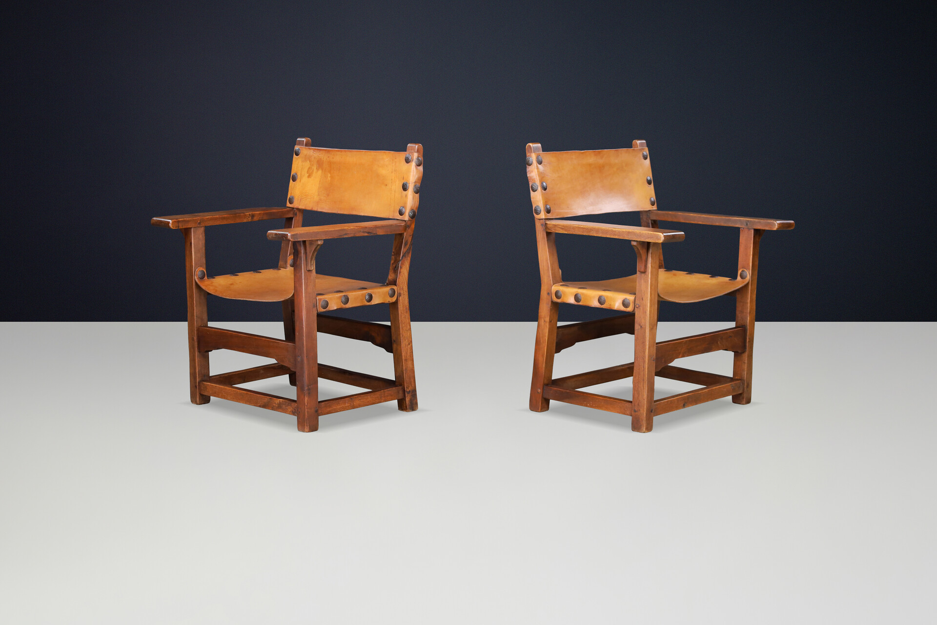 Spanish 1950s Solid Beechwood Armchairs with Patinated Cognac Leather Mid-20th century