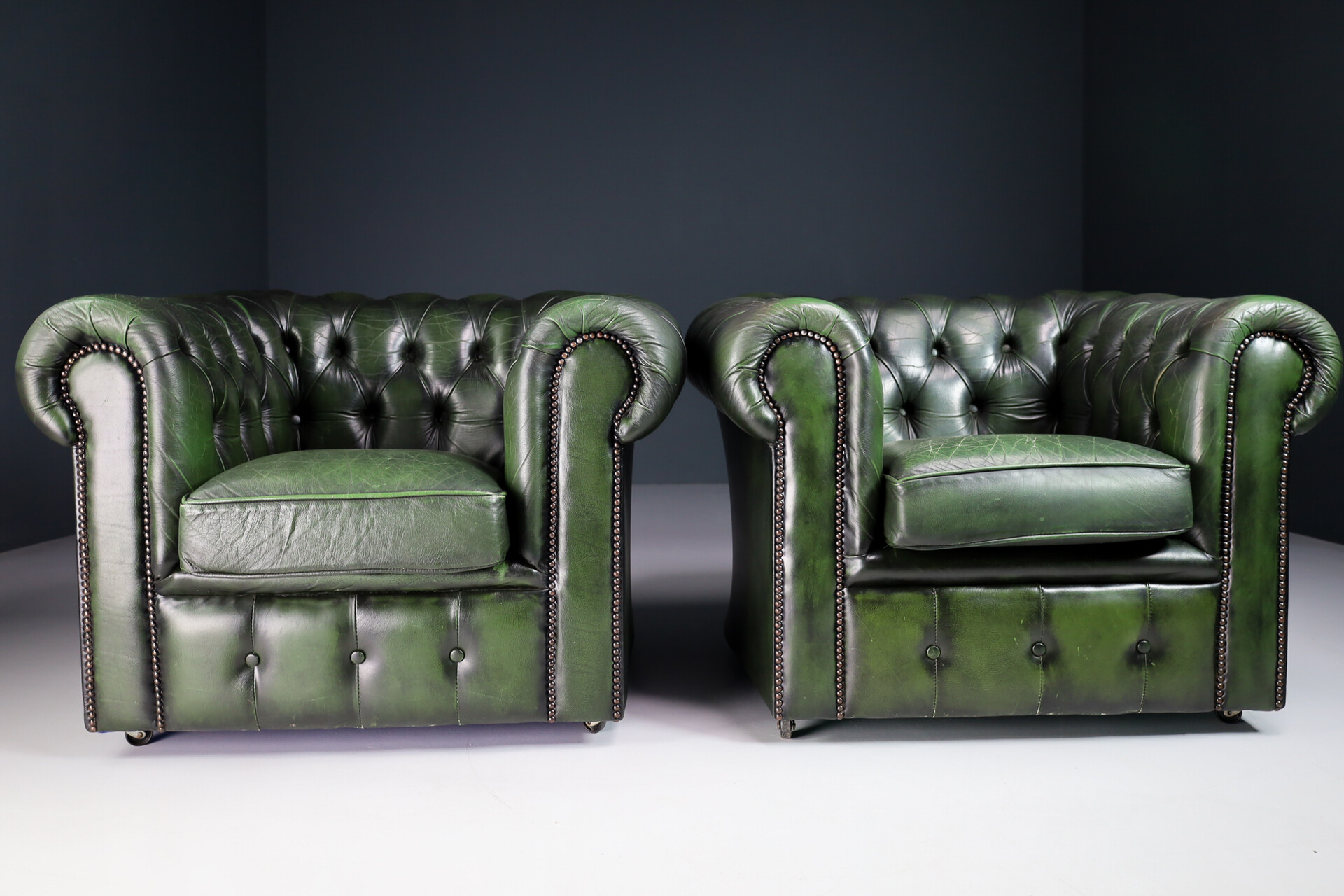 Vintage patinated green leather Chesterfield armchairs  sofa England Late-20th century