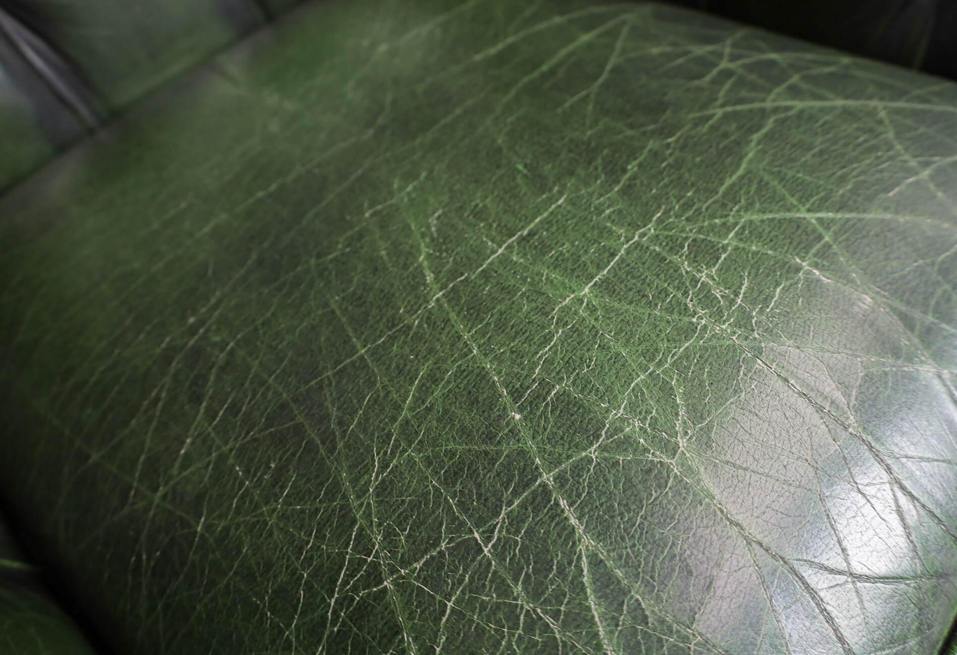 Vintage patinated green leather Chesterfield armchairs  sofa England Late-20th century