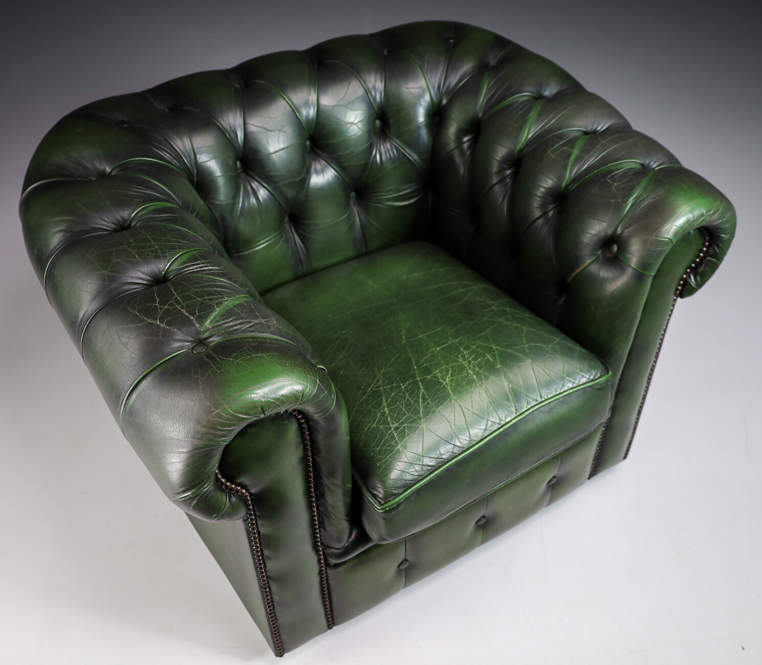 Vintage patinated green leather Chesterfield armchairs  sofa England Late-20th century