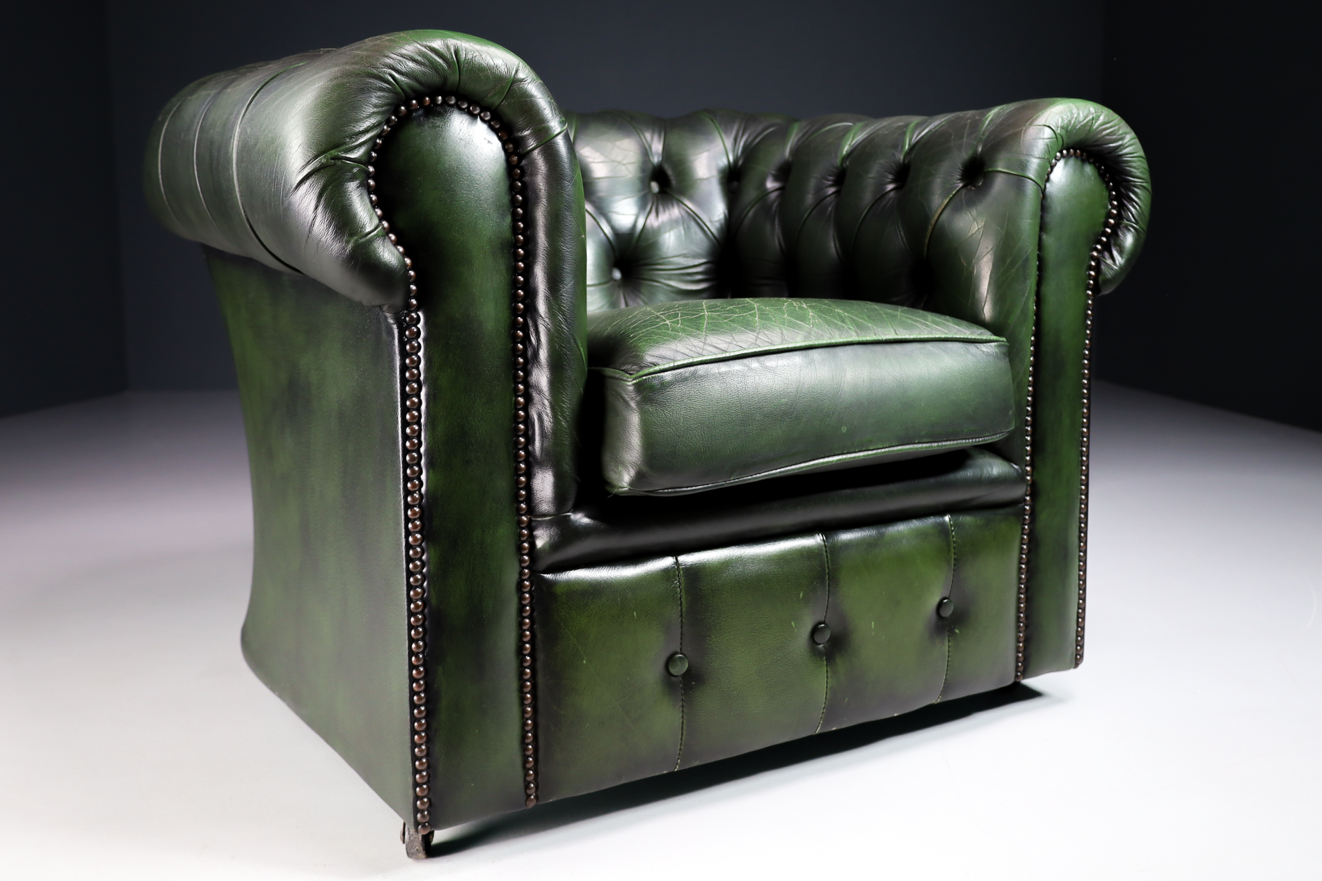 Vintage patinated green leather Chesterfield armchairs  sofa England Late-20th century
