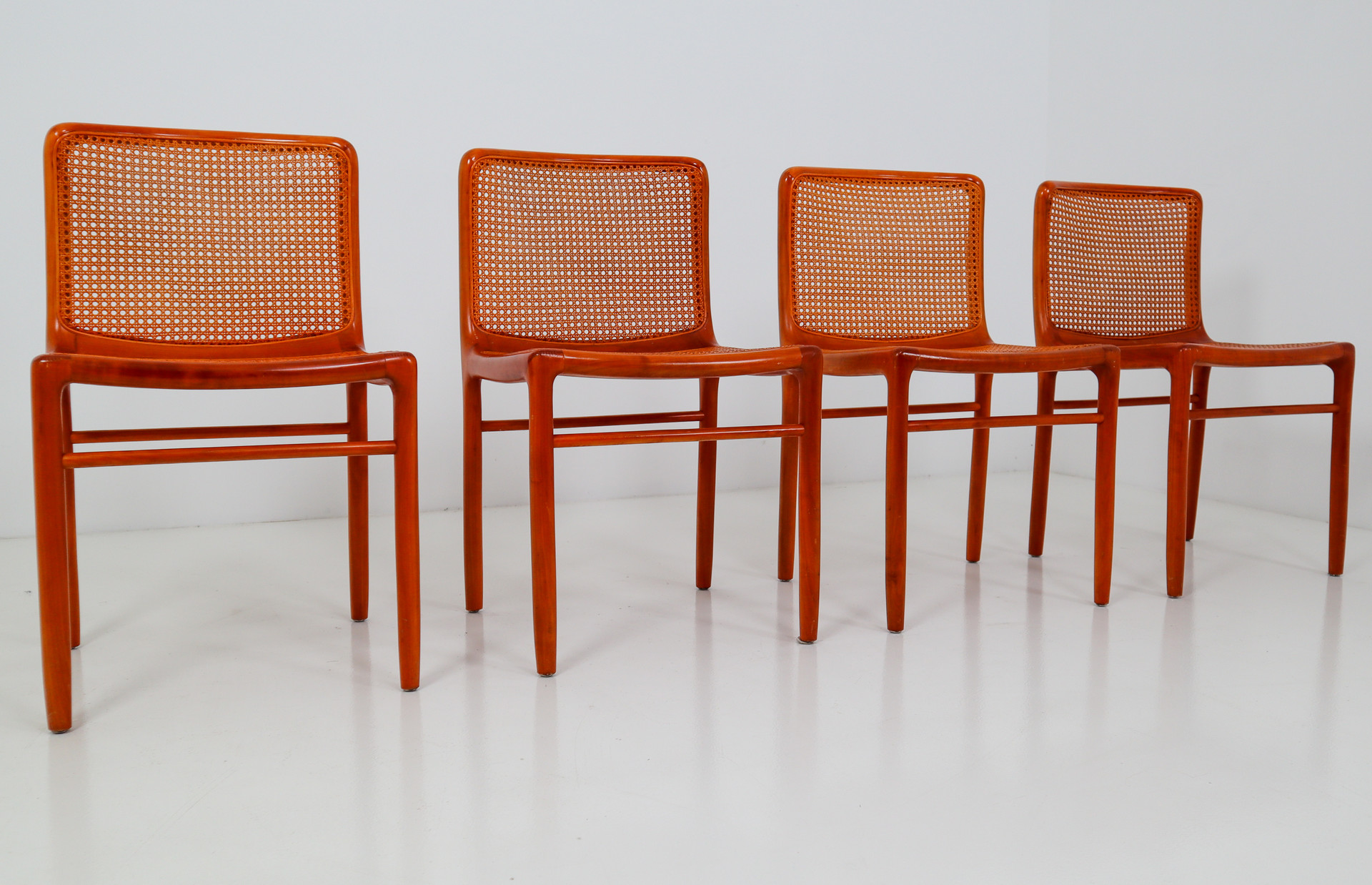 Walnut Dinning chairs with cane seats and backs. Italy 1970s Mid-20th century