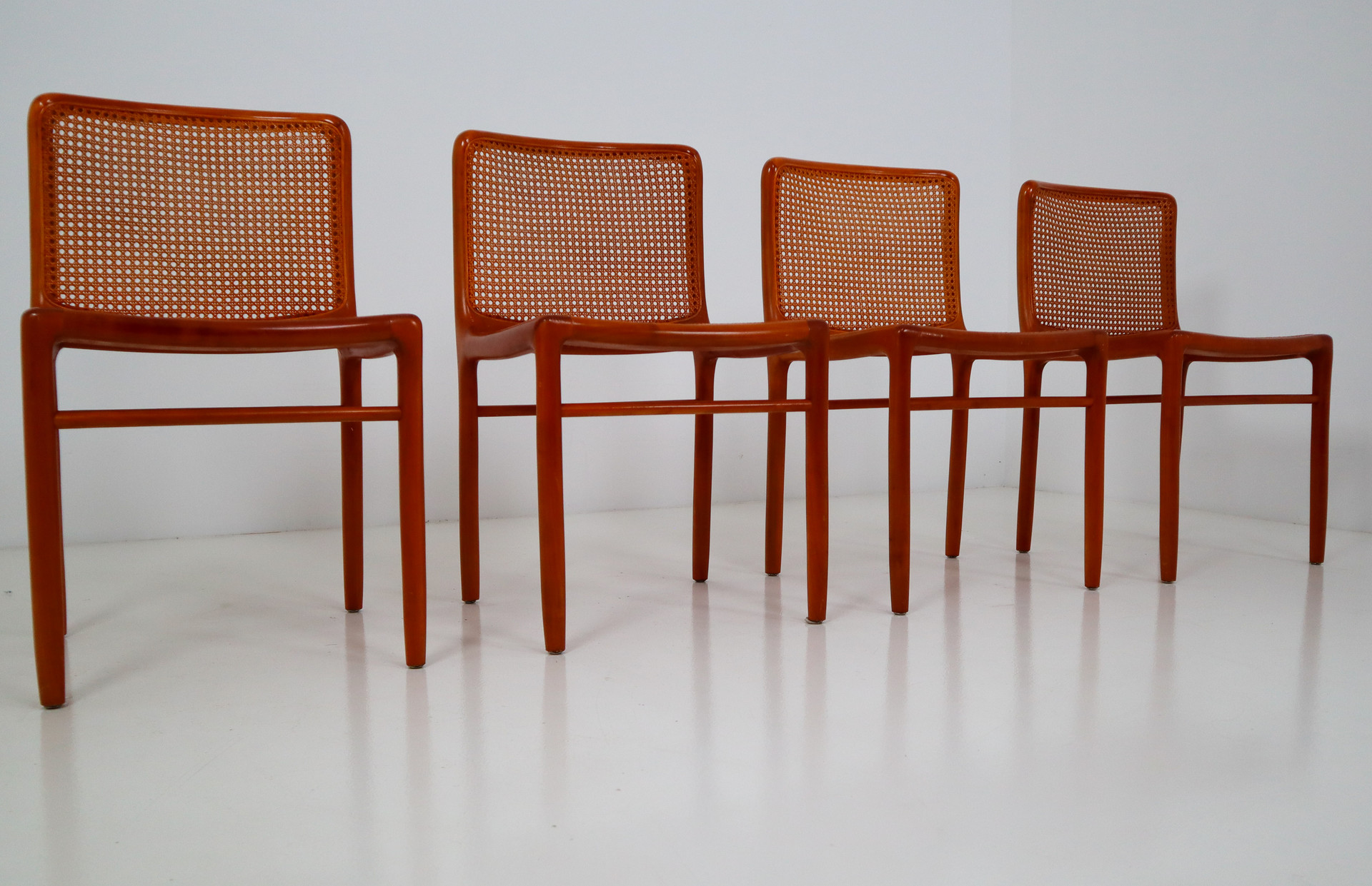 Walnut Dinning chairs with cane seats and backs. Italy 1970s Mid-20th century