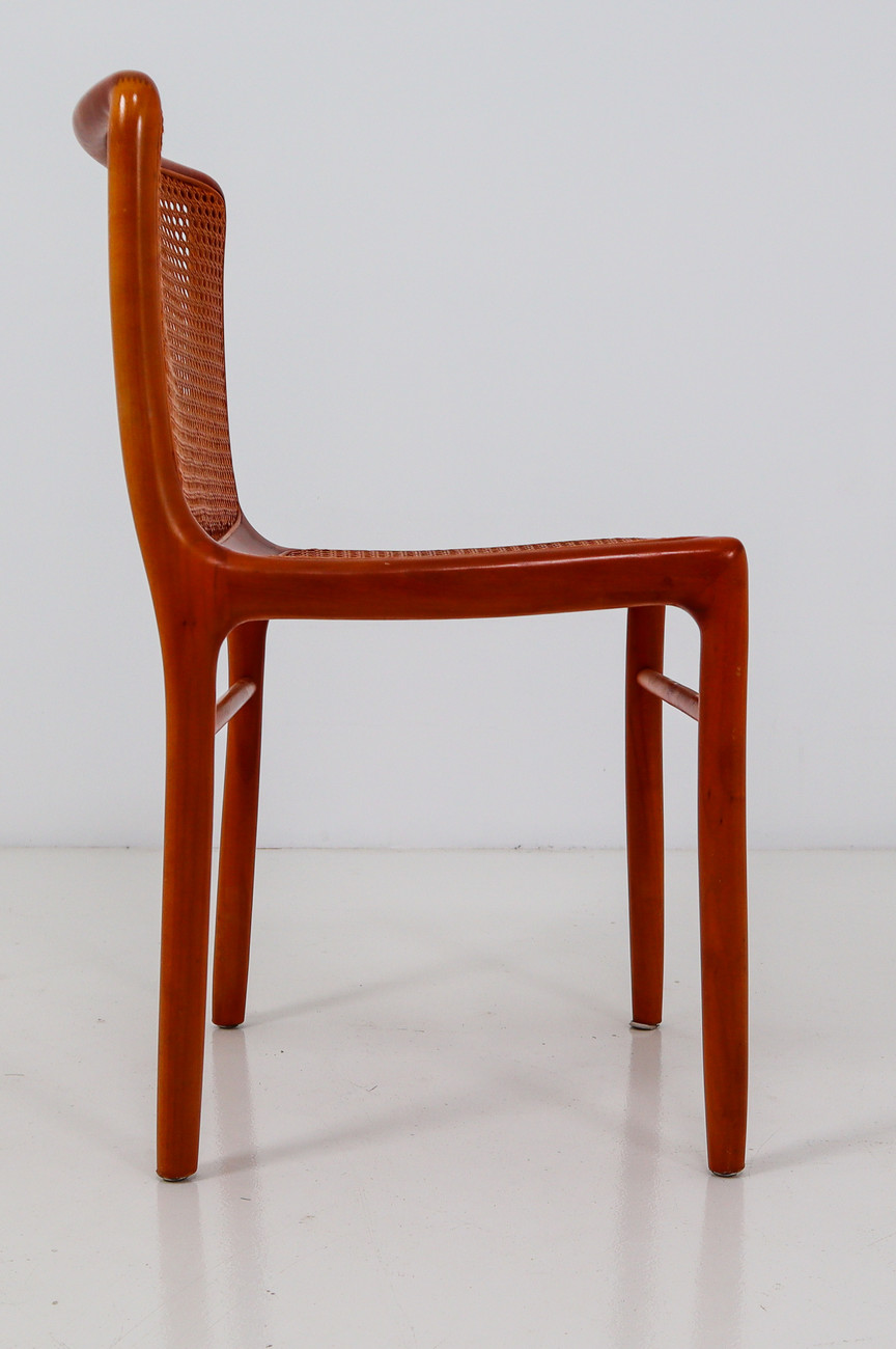 Walnut Dinning chairs with cane seats and backs. Italy 1970s Mid-20th century